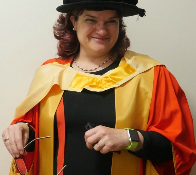 Dr Maria in her Manchester PhD gown