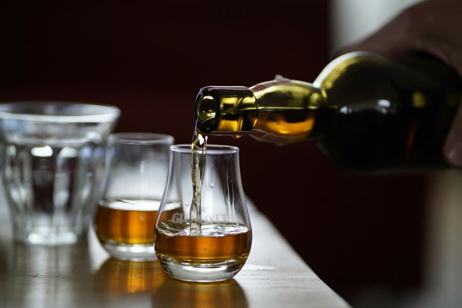 Spending money: expensive whisky or doing good?